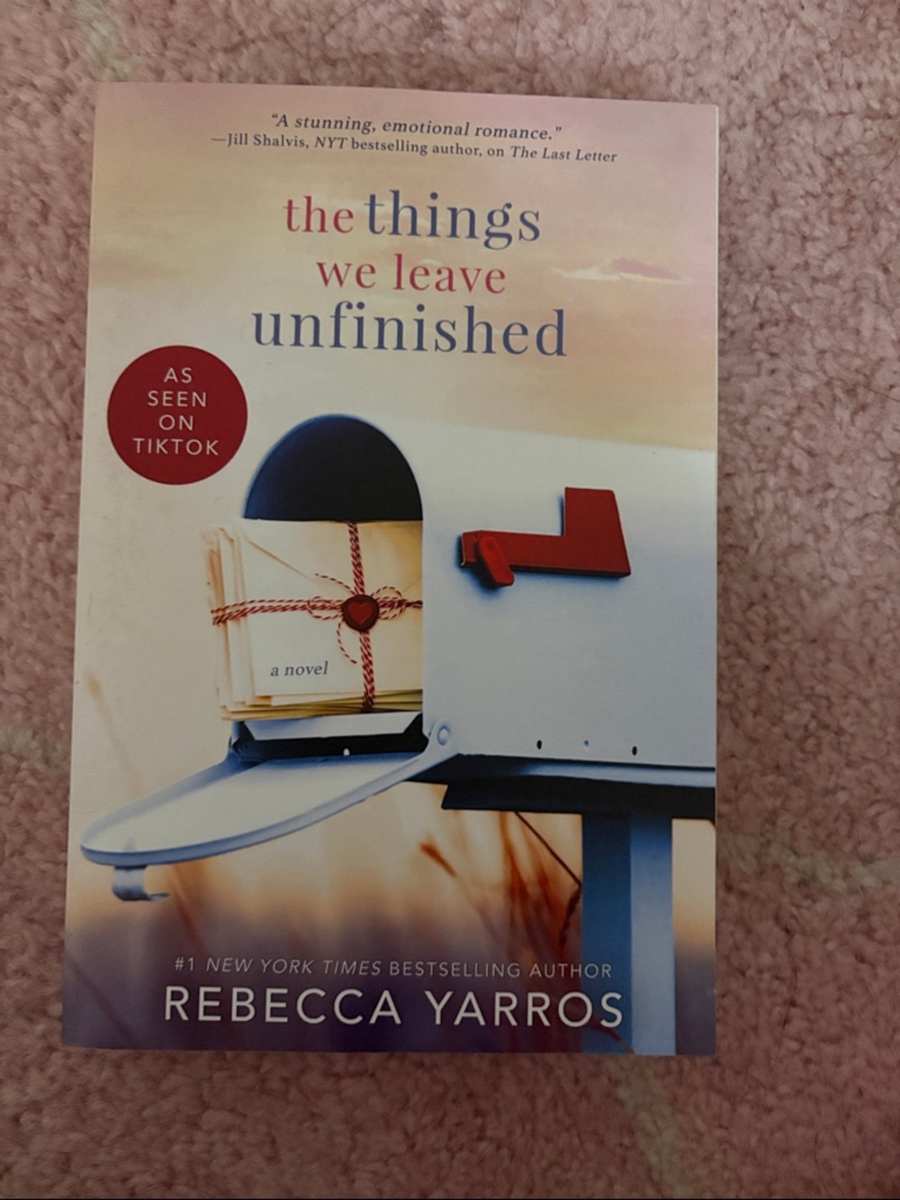 The Things We Leave Unfinished by Rebecca Yarros - White & Red Cover